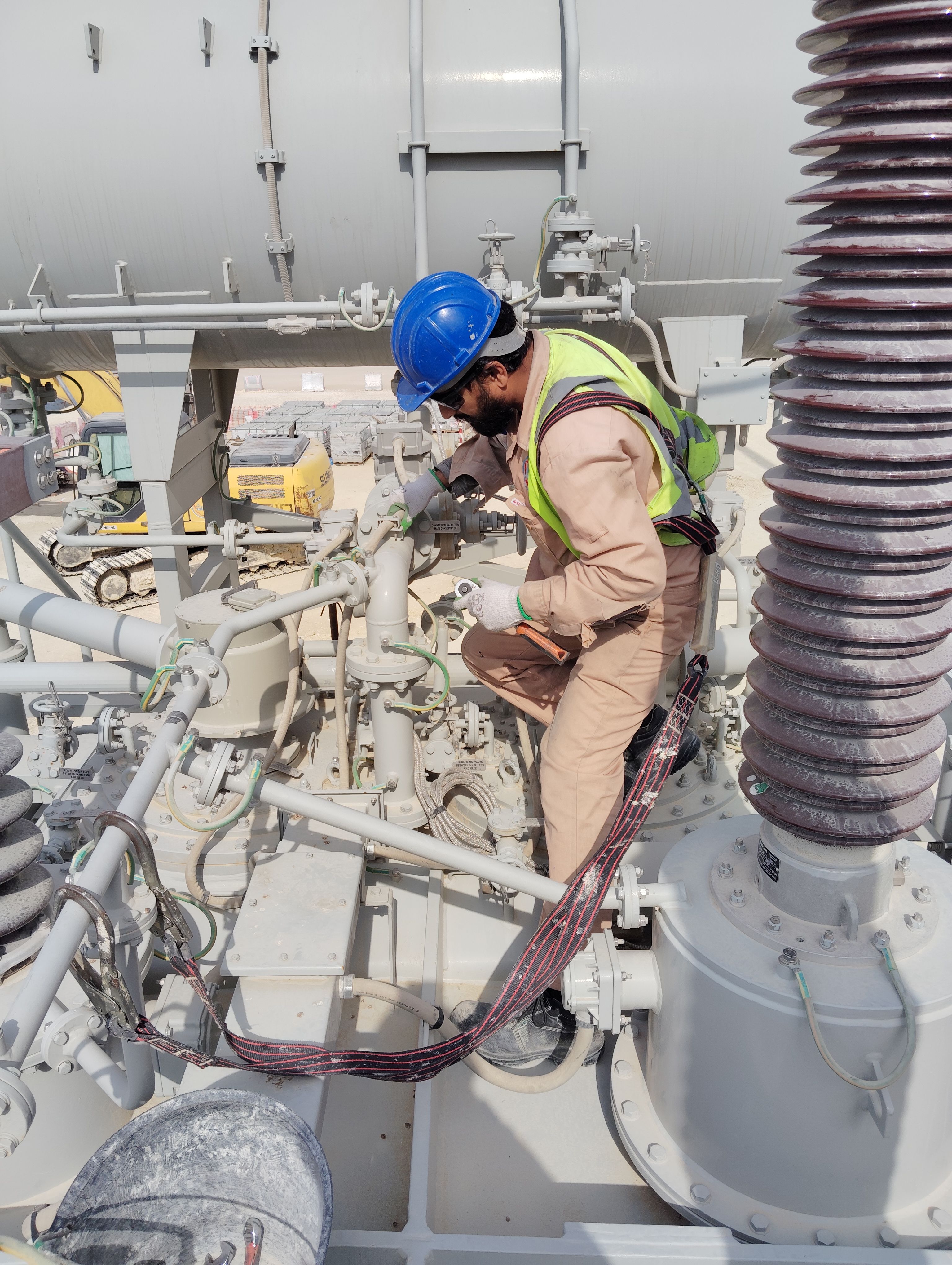 Prime Engineering field engineer inspecting equipment on a tablet, Karachi Pakistan